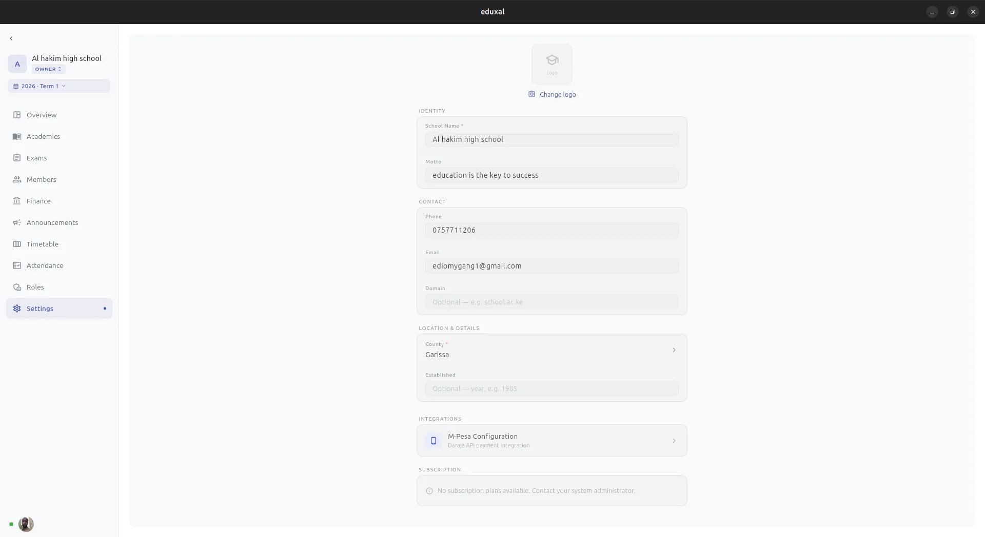 School settings page showing identity configuration, contact details, and M-Pesa integration